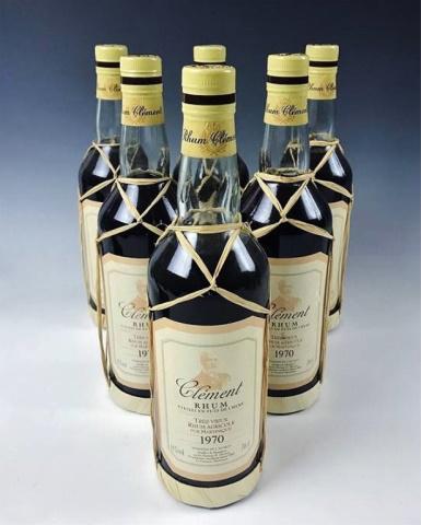Bottles Martinique Clement Rhum, 1970 (6pc): Collection of Six Bottles Sealed with Contents, labeled "Martinique Clement Rhum Tres Vieux Rhum Agricole 1970" Bottles with paper labels and grass embellishment. 70cl.