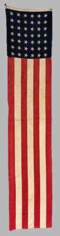 19th C. 42 Star American Flag Banner, 1890: 19th C. Forty-Two Star American Flag Banner, One Year unofficial (1890). Treadle sewn multi piece wool construction with printed stars six rows of seven pattern. Canvas hoist stamped in ink, "STYLE 81