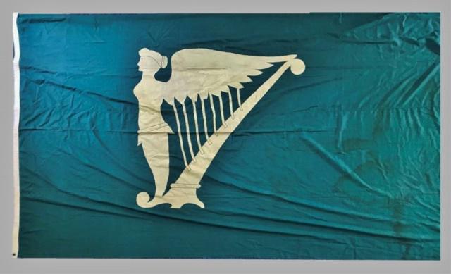 Early 20th C. Irish Harp Flag: Early 20th C. Irish Harp Flag. Sewn multi piece linen construction with sewn applique hand cut harp design at center. Canvas hoist with metal grommets at corners and collection inventory number in ink