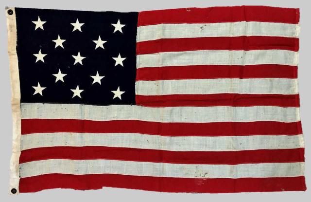 Late 19th C.13 Star American Navy Flag: Spanish American War Period U.S. Navy Thirteen Star Flag. Sewn wool construction with thirteen zig-zag appliqued stars in 3-2-3-2-3 linear pattern. Canvas hoist with brass grommets at corners. Good co