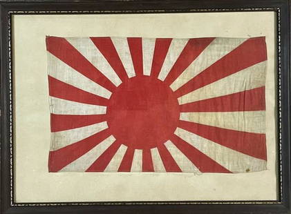 WW2 Japanese Rising Sun Parade Flag: WW2 Japanese Rising Sun Parade Flag. Framed under glass Japanese Rising Sun Flag, red disk and stripes printed on cotton. Flag measures: 16" H x 10" L. wood frame measures: 16" H x 21.5" L.