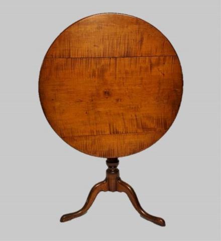 18th C. New England Tiger Maple Tilt Top Table: 18th C. New England Tiger Maple Tilt Top Table. Board top with metal catch hardware, turned pillar and tripod footed base. Excellent condition with highly figured wood, measures: 26.5" H x 30.5" D.