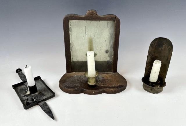 18th- 19th C. New England Candle Holders (3pc): Collection of Three 18th - 19th C. New England Candle Holders: (1) 18th C. spike form wrought iron candle sconce with two candle holders, (1) Brass candle sconce with handle, (1) Wooden candle sconce 