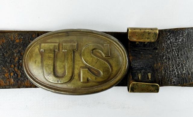 Civil War US Belt and Arrow Back Buckle: Civil War U.S. Belt Buckle and Belt. Brass "US" buckle with leaded arrow back. Leather belt with brass keeper. Good condition with wear.