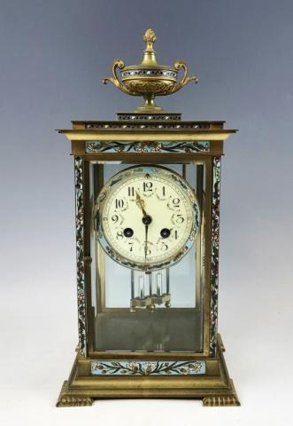 Antique French Cloisonne Mantel Clock: Antique French Mantel Clock. Gilt brass neoclassical style case with four beveled glass panels and hinged door polychrome cloisonne decoration. Clock with eight day time and strike movement with mercu