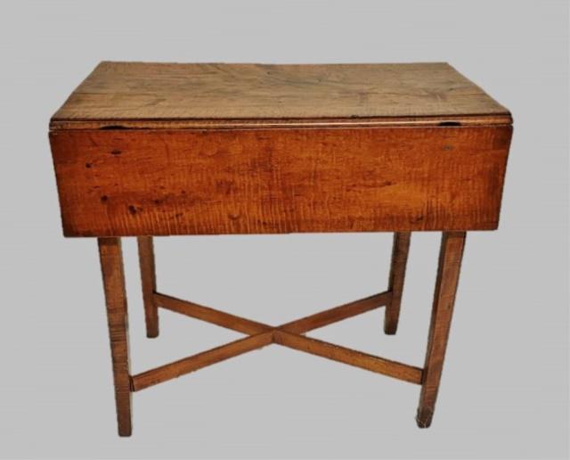 18th C. New England Tiger Maple Pembroke Table: 18th C. New England Tiger Maple Pembroke Table. Crafted of maple with board top with hinged leaves and dovetailed drawer with brass pull. Table with straight tapered legs and cross stretcher base. Exc
