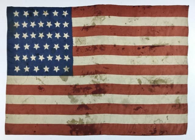 19th C. 39 Star American Parade Flag, 1889: Thirty Nine Star American Parade Flag (1889) Flag printed on silk with stars arranged in a 6-7-7-6-7-6 pattern. Measures 12" H x 16.75" W. The Thirty Nine Star flag was never official, as 5 states (No