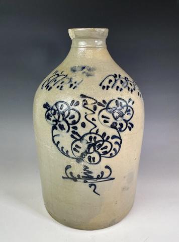 19th C. Floral Decorated Stoneware Jug: 19th C. Stoneware Jug. Heavy salt glazed vessel with loop handle and cobalt floral decoration with "3" impressed at top. Good condition with flake at lip, measures: 15" H X 8.25" W.