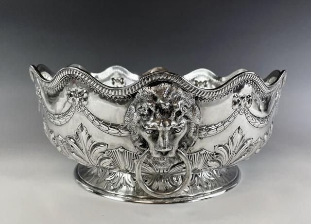 19th C English Sterling Silver Repousse Punch Bowl: 19th C. British Sterling Silver Punch Bowl. Bowl with hallmarks for London 1882 and maker "JA JS" (John Aldwinkle & James Slater). Large hand made bowl with neoclassical repousse foliate decoration wi