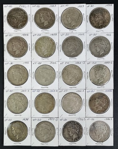 1921-1935 Peace Silver Dollars VF-XF (20pc): Twenty Mixed Date and Mint Marks U.S. Peace Silver Dollars, VF- XF Condition. The coins presented in this auction follow ANA grading standards, but are an opinion only with no warranties or guarantees