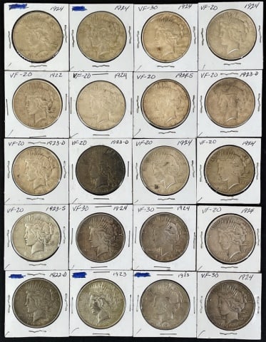 1921-1935 Peace Silver Dollars VF (20pc): Twenty Mixed Date and Mint Marks U.S. Peace Silver Dollars, VF Condition. The coins presented in this auction follow ANA grading standards, but are an opinion only with no warranties or guarantees exp