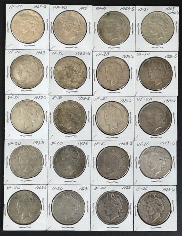 1921-1935 Peace Silver Dollars VF (20pc): Twenty Mixed Date and Mint Marks U.S. Peace Silver Dollars, VF Condition. The coins presented in this auction follow ANA grading standards, but are an opinion only with no warranties or guarantees exp