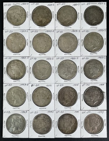 1921-1935 Peace Silver Dollars VF (20pc): Twenty Mixed Date and Mint Marks U.S. Peace Silver Dollars, VF Condition. The coins presented in this auction follow ANA grading standards, but are an opinion only with no warranties or guarantees exp