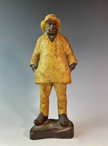 Antique 15" Cast Iron Old Salt, Eastern Specialty: Large Antique "Old Salt" Doorstop, Signed "Eastern Spec. Co." Figure of a fisherman in foul weather gear, painted cast iron. Good condition with wear, measures: 15" H.