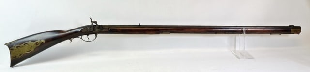 Antique Percussion Fowler: Antique Percussion Hunting Fowler. Carved walnut stock with stylized brass patch box, but and trigger guard. Percussion lock, octagonal steel barrel with fixed forward and rear sight and ram rod. Good