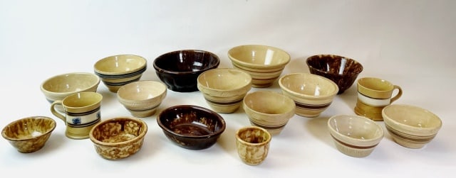 Antique Yellow Ware, Rockingham Vessels (17pc): Collection of Seventeen Antique Yelloware and Rockingham Glaze Vessels: (9) Banded yelloware bowls of varying sizes and styles, (2) Yelloware mugs with decoration, (6) Rockingham glaze bowls of varyin