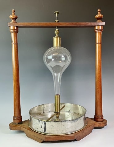 19th C. Laboratory Scientific Equipment: 19th C. Scientific Laboratory Instrument. Wooden base with turned wooden post frame. Removable central blown glass tear drop vessel with integrated brass hardware and rotating stems at base with nozzl