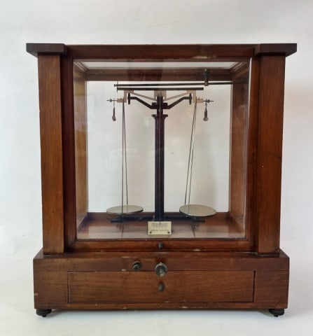 Antique Cased Scientific Scale, Knott Boston: Antique Glazed Wooden Cases Scientific Scale, Signed "KNOTT BOSTON". Wooden case with sliding glass front over drawer. Internal beamed scientific scale with external adjustment knobs, accompanied by p