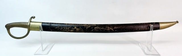 19th C. European Briquet Sword: 18th C. European Briquet Sword. Curved steel blade with cast brass hilt and brass mounted leather scabbard. Excellent condition with bright steel blade, measures: 32.25" L (sheathed), blade: 24.25" L.