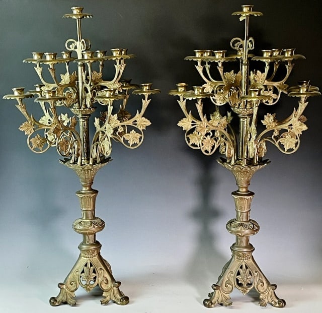 Pair of Antique Gilt Bronze Candelabra (2pc): Pair of circa 1900 Gilt Bronze Candelabra. Stylized stands with fifteen candleholders. Hand chased embellishment with foliate design. Excellent condition, measure: 33" H x 17" W.