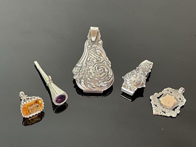 Antique Sterling Watch Fobs, Chatelaines (5pc): Collection of Five Antique Sterling Silver Watch Fobs and Chatelaines: (1) Sterling silver chatelaine, Gorham with 1889 copyright date, (1) Sterling silver chatelaine, Gorham, (1) English sterling sil