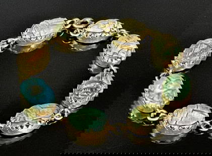 18K Gold Faience Egyptian Scarab Bracelet: Antique 18K Gold Egyptian Scarab Bracelet. 18K yellow gold link bracelet set with multi color faience Egyptian scarabs with varying incuse carved reverse designs. Excellent condition, measures: 7.5" L