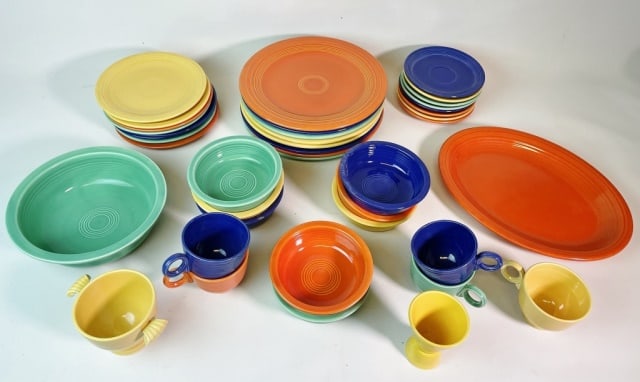 Collection of Vintage Fiestaware (30pc): Thirty Piece Collection of Vintage Multicolor Fiestaware: (8) Dinner plates with reverse mark, (8) Salad plates with reverse mark, (8) Saucers with back mark, (8) Bowls with back mark, (5) Coffee mugs