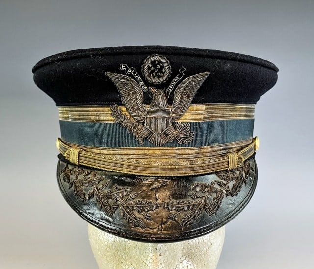 WW1 US Army M1902 General Officer Visor Cap: World War One Model 1902 General Officer's Cap, Signed "R.D. Crane & Co". Blue wool construction with gold and blue band with lacquered visor, interior silk lined with leather sweat band. Cap with bul