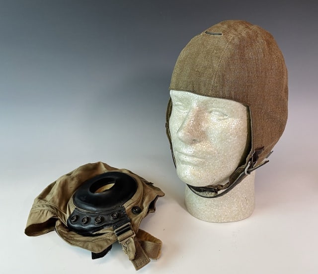 Two WW2 Flying Caps, US and German (2pc): Two World War Two Flying Caps: (1) German Summer flying cap. Cloth and leather construction, internal label marked "GR 56" with "RBNr" number, (1) USAAF A10A Summer flying cap. Cloth construction with