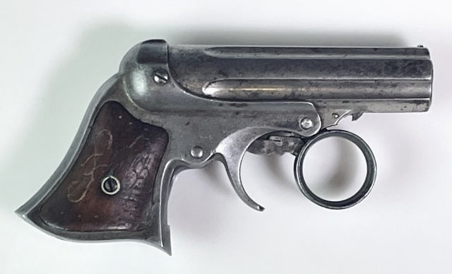 1870's .22 Cal. Pepperbox Pistol Remington & Sons: 1870's Diminutive Pepperbox Pistol, Barrel SIgned "E. Remington & Sons, Ilion N.Y." with 1860 and 1861 patent date. Steel frame with five bore barrel in .22 caliber. Ring trigger with wood grips. Exce