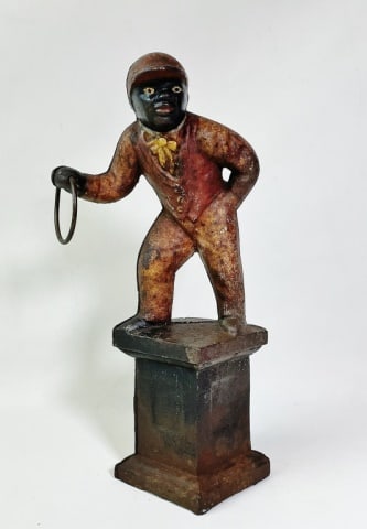 Antique Painted Cast Iron Black Americana Figure: Antique Painted Cast Iron Figure of Jockey with Ring. Likely a rail or entrance finial, two piece construction with screw attachment. Good condition with oxidation, measures: 11.5" H.