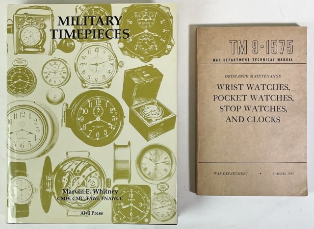 Books, Military Timepieces (2pc): Two Books: (1) "Military Timepieces" by Marvin E. Whitney (AWI Press, 1992), Quarto, cloth with dj, 668pp; (1) "War Department Technical Manual TM 9-1575: Ordinance Maintenance Wrist Watches, Pocket W