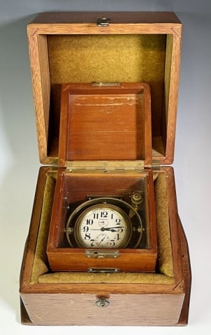20th C. Cased Ship's Chronometer, Zenith: 20th C. Cased Ship's Chronometer, Signed "ZENITH". Eight-day movement, 2.5" white face with Arabic Numeral radial dial with sub seconds dial and up-down indicator. Face signed "ZENITH CHRONOMETER". Do