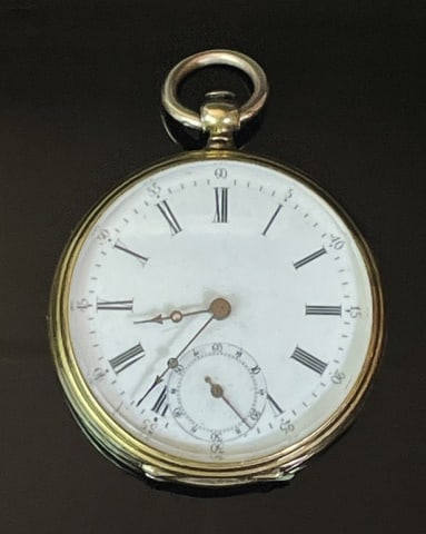 18K Gold Continental Pocket Watch: Antique Continental 18K Gold Pocket Watch. 18K yellow gold open face engraved decorated case. Jeweled gilt movement, porcelain face with Roman Numeral radial hours and minutes dial with sub seconds. G