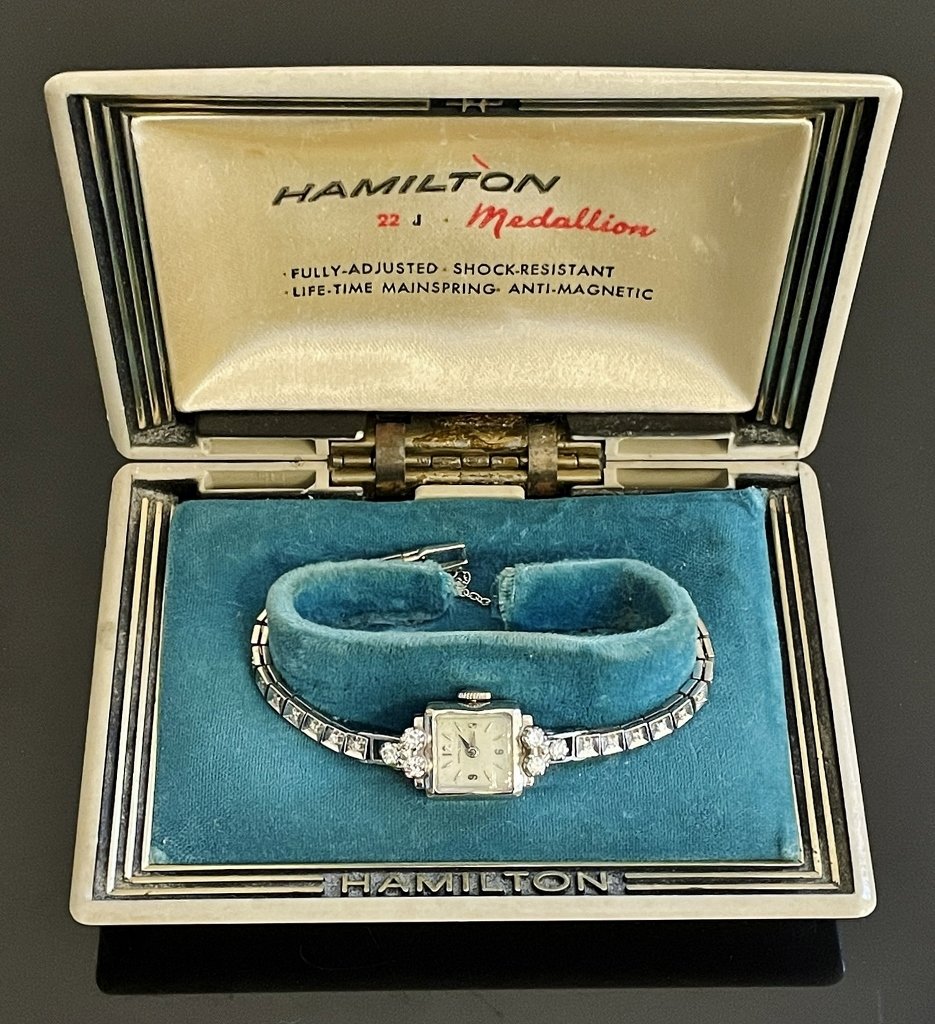 Antique 14K Gold Art Deco Diamond Watch, Hamilton: Antique 14K Fold Diamond Ladies Wristwatch, Signed "HAMILTON". Crafted of 14K white gold, watch face flanked by three round cut diamonds, link band set with small round cut diamonds. Good running cond