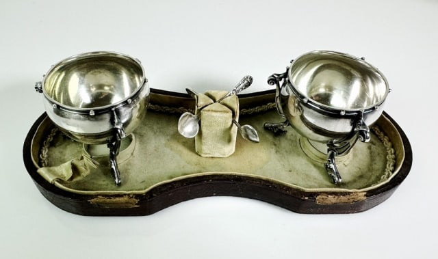 19th C. Cased Sterling Silver Salts, Gorham: 19th C. Cased Sterling Silver Open Salts, Gorham. Pair of sterling silver three footed open salts with spoons. Salts engraved "Fannie 1891". Salts with fitted leatherette case. Good condition, case fa
