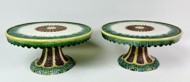 Pair, Antique Etruscan Majolica Cake Stands (2pc): Matching Pair of English Etruscan Majolica Cake Stands, stylized stands on decorative columns and gadrooned edges. Excellent condition, measure: 4.75" H x 10" D.