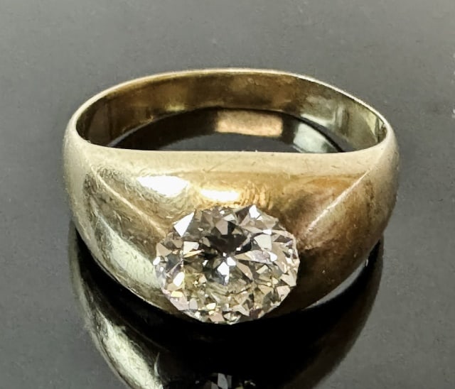 Antique 14K Gold Diamond Solitaire Ring: Antique 14K Gold Diamond Solitaire Ring. Crafted of 14K yellow gold, set with one exceptional mine cut diamond, evaluated as 1.2 cts, VS1 clarity and F color. Ring in good condition, total assembled w