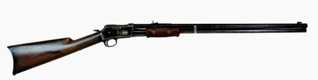 1884 Pump Action Rifle .38 Cal., Colt Lightning: 1884 Manufactured Colt Lightning Pump Action Rifle .38 Cal. Pump action with checkered wooden slide, octagonal barrel with front and rear sights, barrel signed "COLT'S PT. F.A. MFG. CO HARTFORD CT. U.