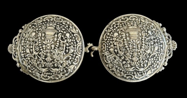Antique Two Piece Repousse Silver Belt Buckle: Antique Romanian Repousse Silver Two Piece Belt Buckle. Large shield form buckle with profuse floral repousse decoration with center hook attachment. Good condition, measures: 4.25" H x 10" W. weight: