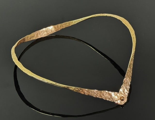 14K Gold Custom Hammered Necklace: 14K Gold Custom V shaped Necklace. Crafted of 14K yellow gold with hammered surface and pin release. Excellent condition, weight: 13.4 dwts, 21.1 g.