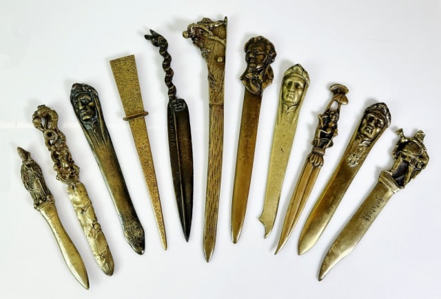 Antique Bronze Figural Letter Openers (11pc): Collection of Eleven Antique Figural Bronze Letter Openers. Diverse themes including literary figures and bowling. Good condition, largest measures: 12" H.