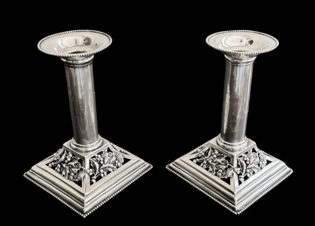 Sterling Silver Candlesticks, Theodore Starr (2pc): Antique Sterling Silver Figural Candlesticks, Signed "Theodore B. Starr". Columnar candlesticks with reticulated holly leaf decoration. Excellent condition, measure: 6" H , weight: 10.2 Ozt.