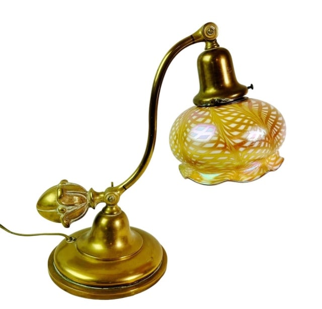 Antique Cast Brass Glass Shade Piano Lamp: Antique Cast Brass Piano Lamp with Art Glass Shade, Steuben, Fishnet Pattern. Heavy solid cast brass lamp base with adjustable arm and acorn finial. Shade in blown aurene glass with swirling fishnet p
