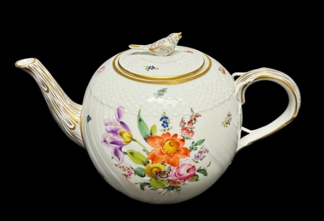 Vintage Hand Painted Porcelain Teapot, Herend: Hand Painted Hungarian Porcelain Teapot, Signed "HEREND HUNGARY". Hand painted floral decoration with bird finial and gilt embellishment. Excellent condition, measures: 6" H x 10" W.