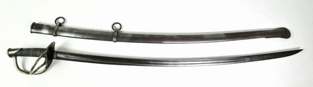 Civil War Model 1840 Cavalry Sword, GG: Civil War Model 1840 Cavalry Sword, Signed "G.G.". German import sword with single fullered curved steel blade, ricasso marked "GG" with crown above. Brass three branch gaurd with wire wrapped leather