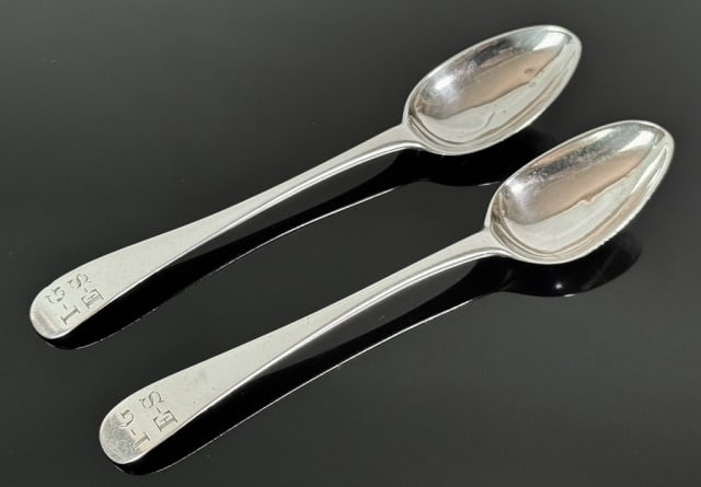 18th C Boston Coin Silver Spoons, CL (2pc): Pair of 18th C. American Coin Silver Scallop Back Spoons, Signed "CL", (Charles Leach, Boston 1765-1814) Period monogram "I-G E-S, Good condition, measure: 5" L, Combined Weight: .8 Ozt.