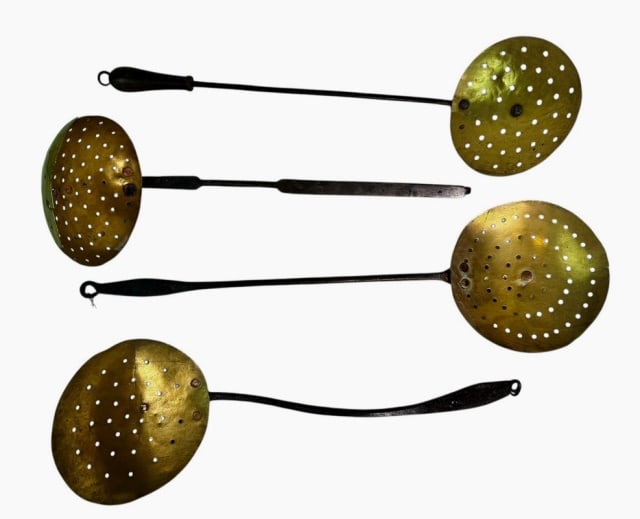 18th - 19th C. Wrought Iron Bass Skimmers (4pc): Four 18th - 19th C. New England Wrought Iron Brass Skimmers. Bench made iron handles of varying form with pierced hammered brass bowls attached with peened copper. Good condition with wear, largest me
