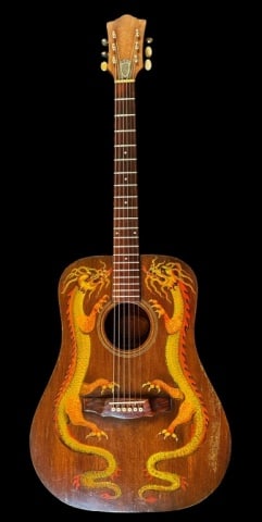 1971 Guild D25 Acoustic Guitar, Painted Decoration: 1971 Production Acoustic Guitar, Signed "GUILD GUITARS INC." Model D 25, six string acoustic guitar with mahogany body and rosewood fretboard, interior label with hand written serial number "53714". P