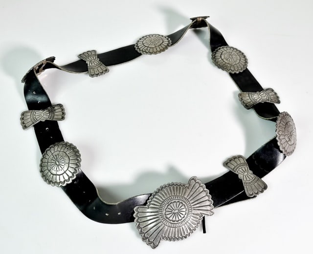 Vintage Navajo Old Pawn Silver Concha Belt: Vintage Navajo Old Pawn Concha Belt. Leather belt with eleven hand hammered and chased plates. Good condition, measures: 47" L.